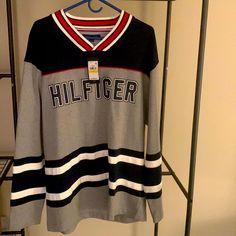 Tommy Hilfiger Sweatshirt. Navy Blue, Gray, White, And Red. Never Worn. Excellent Condition. Gray Long Sleeve College Sweater, Gray Long Sleeve Sweater For College, Tommy Hilfiger Cotton College Tops, Tommy Hilfiger Casual Tops For College, Casual Tommy Hilfiger Tops For College, Casual Tommy Hilfiger Cotton Sweater, Tommy Hilfiger Winter Streetwear Tops, Tommy Hilfiger Sporty Top With Ribbed Cuffs, Tommy Hilfiger Long Sleeve Streetwear Tops