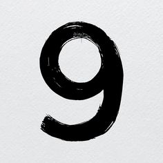 the number nine drawn in black ink on white paper