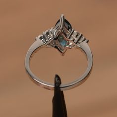 It is a London blue topaz ring. The main stone is 6mm*12mm marquise cut, weight about 2.28 carats. The basic metal is sterling silver and plated with rhodium. To change the metal to a solid gold (white/rose) or platinum is also available, please ask for a quotation if you want. You can also go to my shop Home for more elegant rings: https://www.etsy.com/shop/godjewelry?ref=hdr_shop_menu More London blue topaz rings: https://www.etsy.com/shop/godjewelry?search_query=London+blue+topaz Customizatio Blue Topaz Rings, Topaz Rings, Elegant Rings, Blue Gemstone Ring, Blue Gemstone Rings, Ring Marquise, London Blue Topaz Ring, Elegant Ring, Bridal Ring