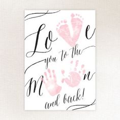 a pink hand and foot print with the words love you to the moon and back