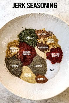 a white bowl filled with different types of seasoning