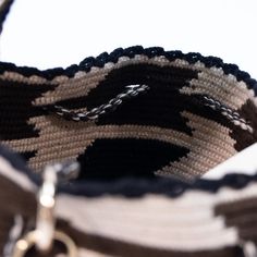 Introducing the exquisite Darinka Medium Bag in Dark hue, a true reflection of Colombian artisan craftsmanship. Handwoven over several weeks with intricate attention to detail, this bag exudes a unique charm and timeless elegance. Perfect for adding a touch of sophistication to any outfit, this piece is a true work of art that showcases the skill and dedication of Colombian artisans. 100% Natural Cotton Thread  Hand wash Designer Crochet Top Handle Bag For Everyday Use, Designer Crochet Bag With Top Handle For Everyday Use, Designer Crochet Bag With Handles For Everyday Use, Designer Crochet Bag For Everyday Use, Designer Rectangular Crochet Bag For Daily Use, Luxury Crochet Bag With Double Handle For Daily Use, Luxury Crochet Shoulder Bag With Leather Handles, Luxury Crochet Tote Bag With Leather Handles, Luxury Crochet Bag With Double Handle