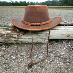 Crazy Reddish Black Horse  Antique Australian Western Style Leather Cowboy Hat *Leather Cowboy Hats with Competitive Price. *100% Real Leather Hat premium quality cow leather. *Light weight and comfortable. *Extremely Fashionable First Sight look . *Adorable Brown Split with All Sizes Available  S / M / L / XL /2xL. *Rainproof showerproof . *Free Chinstrap included Package includes:  1 x Hat ( Our packing sent out to you securely in box) Measurement Small:-                     S        (55cm-56cm) Medium :-               M        (57cm-58cm) Large :-                     L             59cm XL :-                          XL           60cm 2XL :-                        2XL     (61cm-62cm) Package Includes:     1 x Hat Country Style Adjustable Hat Band For Brimmed Hats, Adjustable Country Style Top Hat For Outdoor, Country Style Wide Brim Top Hat For Outdoor, Adjustable Brown Hat Band For Country Events, Adjustable Fit Brown Hat For Country Events, Western Style Adjustable Top Hat For Outdoors, Adjustable Fit Brown Country Hat, Adjustable Fit Country Style Brown Hat, Brown Adjustable Fit Country Hat