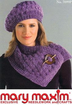 a woman wearing a purple knitted hat and scarf with a wooden button on it