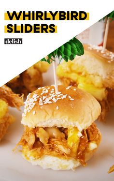 there is a sandwich with pineapples on it and the words, whirlybird sliders delish