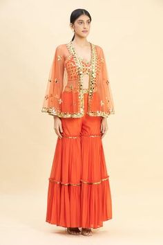 Shop for Preeti S Kapoor Orange Georgette Embroidered Cape And Sharara Set for Women Online at Aza Fashions Traditional Palazzo Set With Sequins For Reception, Traditional Sequin Palazzo Set For Reception, Traditional Drape Sequin Palazzo Set In Chinon, Semi-stitched Chanderi Sharara With Sequins, Semi-stitched Sequined Chanderi Sharara, Chanderi Sequined Semi-stitched Sharara, Traditional Sequined Palazzo Saree Set, Sequin Sharara For Designer Wear Navratri, Fitted Chanderi Embellished Sharara