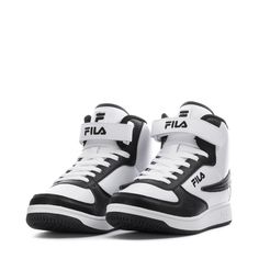 Upgrade your look with a standout classic sneaker. The FILA A High shoes feature a pebbled leatherette upper with stitched overlays to create a streamlined look. Perforations on the toecap add airflow where you need it most, and the textile lining is soft and comfortable. An adjustable closure strap at the front allows for a custom fit. Lace-up high-top with an adjustable closure strap. Durable synthetic leather upper. Perforated toe cap adds breathability. Embroidered logo detailing throughout. Sports Lace-up High-top Sneakers With Rubber Heel Cap, Black Basketball Shoes With Rubber Heel Cap, Sporty Basketball Shoes With Rubber Heel Cap, Lace-up Basketball Shoes With Rubber Heel Cap For Sports, Lace-up Basketball Shoes With Rubber Heel Cap, Mid-top Synthetic Skate Shoes For Sports, Synthetic Skate Shoes With White Sole, Streetwear Low-top Basketball Shoes With Rubber Heel Cap, Sporty High-top Basketball Shoes With Rubber Heel Cap