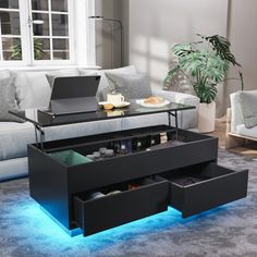 a coffee table with drawers underneath it in a living room