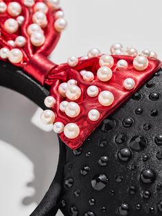 a minnie mouse ears with pearls on it