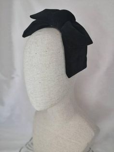 1950s/1960s inspired, this gorgeous velvet double bow is handmade from a dense cotton velvet, giving it a lovely structure without being stiff. Attaches with 2 combs, metal headband or hat elastic in black or cream. ***Please note that the headband is a standard adult size and isn't suitable if you have a small head and/or fine/short hair. I would recommend choosing the hat elastic. Combs are good for thicker hair. If you're unsure of what attachment to go for drop me a message and I'll do my be Chic Bow Hair Accessories For Party, Chic Party Hair Accessories With Bow, Vintage Evening Headband Hair Accessory, Vintage Evening Headband, Chic Party Hair Accessories With Satin Bow, Vintage Evening Fascinator Headband, Vintage Formal Headband Costume Hat, Vintage Formal Costume Headband, Formal Headband With Satin Bow