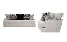 two white couches with black and grey pillows on top of each one in front of a white background