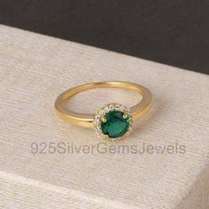 Emerald & Diamond 14K Solid Gold Ring, Unique Emerald Engagement Ring, Statement Art Deco May Birth Stone Jewelry, Gift for her, His, Him. Product & Gemstone Details -  Diamond Size  :- 1 mm Diamond Pcs   :- 20 Diamond Color Clarity :- IJ, SI-SI1 Gemstone   :- Lab Created Emerald Gem Color  :- Green Metal Wight:- 1.7 Gram Metal            :- 14K Solid Gold Stamp          :- 14K These rings are best to use everyday and can make a great gift as well Every Jewelry is made from the very scratch, and Gold Emerald Ring With Diamond Halo, Gold Emerald Ring With Halo Design, Gold Emerald Ring With Diamond Halo Design, Gold Emerald Ring With Halo Diamond Design, Gold Emerald Cluster Ring With Brilliant Cut, Emerald Cluster Ring Stamped 14k, Gold Rings With Emerald And Halo Setting, Gold Emerald Ring With Halo Design For Anniversary, Round Emerald Cluster Ring Stamped 14k