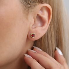 Discover the perfect blend of luxury and sentiment with our 14k Solid Gold Heart Stud Earrings, featuring a stunning Garnet birthstone, symbolic of January birthdays. These exquisite earrings are meticulously handcrafted with the highest quality materials, ensuring not only a dazzling appearance but also durability. The timeless heart shape, combined with the vibrant sparkle of the Garnet real diamond, makes this pair an ultimate expression of love and affection. Each earring is carefully constr Birthstone Earrings For Valentine's Day, Valentine's Day Gift Jewelry With Halo Design, Elegant Heart Gemstone Earrings For Valentine's Day, Valentine's Day Gemstone Earrings Gift, Valentine's Day Anniversary Gemstone Heart Earrings, Fine Jewelry Heart Earrings With Birthstone, Gemstone Heart Earrings For Anniversary, Elegant Gold Heart Earrings With Birthstone, Heart-shaped Halo Design Earrings For Gift