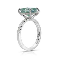 teal moissanite radiant cut pavé ring