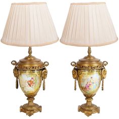 two lamps that are sitting next to each other