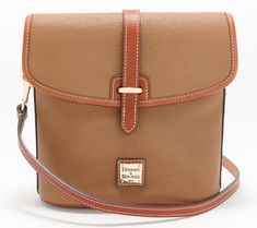 Sized just right for running a quick errand or casually strolling through the city center, this stylish crossbody makes a great grab-and-go option. The lined interior is oh-so spacious and the foldover flap has a strap closure that secures your belongings. From Dooney & Bourke. Fall Travel Satchel With Flap Shape, Fall Travel Satchel With Flap, Fall Travel Flap Satchel, Fall Travel Satchel In Pebbled Leather, Pebbled Leather Satchel For Travel In Fall, Casual Flap Bag With Detachable Strap, Everyday Textured Leather Flap Bag, Textured Leather Travel Flap Bag, Leather Travel Bag With Fold Over Clasp