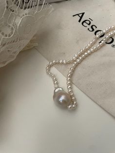 Hi, here is SAKA.  Our collection features exquisite handmade creations, lovingly crafted at our Small Family Farm. The heart of our work is the Baroque pearls, sourced from my Grandfather's Century-Old pearl farm in Japan. These pearls have been cultivated through generations of dedicated care, bringing a piece of history to Modern Beauty. Each item in our shop is a celebration of artisanal skill and the timeless elegance of nature's treasures. Discover the unique charm and rich legacy embedded Pearl White Single Strand Sterling Silver Necklace, Single Strand Pearl White Necklace In Sterling Silver, Pearl White Single Strand Necklace In Sterling Silver, Baroque Pearl Clavicle Chain Jewelry Gift, Fine Jewelry Baroque Pearl Necklace Gift, Fine Jewelry Pearl Charm Necklace For Gift, White Baroque Pearl Necklaces As Gift, Fine Jewelry White Round Bead Necklaces, Fine Jewelry Sterling Silver Necklaces In Pearl White