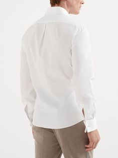 Find BRUNELLO CUCINELLI Long-sleeved Cotton Shirt on Editorialist. white cotton front button fastening fabric-covered buttons classic collar long sleeves buttoned cuffs curved hem Timeless White Button-up Blouse, Timeless White Workwear Tops, Timeless White Tops For Workwear, Timeless White Tops For Work, Classic White Blouse With Fold-down Collar, Classic White Blouse With Fold Down Collar, Classic White Tops With Covered Buttons, Classic White Slim Fit Blouse, Timeless Dress Shirt With Hidden Button For Work