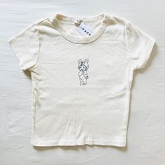 Bnwt Brandy Melville/John Galt Angel Baby Cherub Teddy Bear Pajama Cream Ashlyn Graphic T-Shirt Thick Cotton Kewpie 17 X 13 Unisex Cute Tops For Loungewear, Cute Cream Loungewear Tops, Cute White Organic Cotton Tops, Cute Cream Tops For Loungewear, Cream Short Sleeve Top For Playtime, White Unisex Tops For Loungewear, Fitted Cotton Top For Bedtime, Cute Short Sleeve Tops For Bedtime, Fitted Short Sleeve Bedtime Top