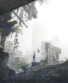 a man standing on top of a pile of rubble next to a bird in the sky