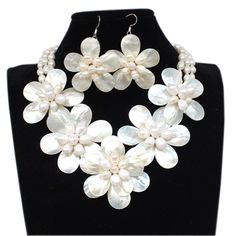 "Material:Natural white shell, Natural freshwater pearll,Cowhide rope, lobster clasp Bead size: 6-7-8mm, 13*18mm,15*20mm Necklace size: 18\" + 2\" extension chain Color: White Packing: Beautiful Pouch All items in my shop are made to order. . Most of the time it takes 1-3 business days but can be longer at times and for larger orders. If you want to order of different style. Please contact me . ----------------------------------------------------- Please feel free to convo me should you have any question! Thank you! :)" Mother Of Pearl Flower Jewelry For Anniversary, Anniversary Jewelry Mother Of Pearl Flower Shape, Anniversary Jewelry In Flower Shape With Mother Of Pearl, Anniversary Flower Shaped Mother Of Pearl Jewelry, White Shell-shaped Shell Jewelry, Flower Shaped Mother Of Pearl Jewelry With Pearl Drop, Flower-shaped Mother Of Pearl Jewelry With Pearl Drop, White Mother Of Pearl Flower Shaped Jewelry, White Mother Of Pearl Jewelry In Flower Shape