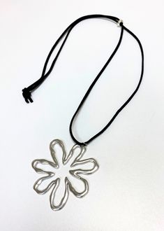 silver stainless steel flower pendant necklace adjustable black felt chain statement piece jewelry edgy women's fashion Trendy Flower Necklace For Spring, Spring Flower Pendant Necklace For Party, Spring Party Necklace With Flower Pendant, Silver Bohemian Necklace For Spring, Spring Flower-shaped Metal Necklaces, Spring Flower-shaped Metal Necklace, Trendy Flower Charm Necklace For Spring, Flower Pendant Necklace For Party, Trendy Metal Necklaces For Spring