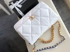 Description CC 19 Maxi HandBag White For Women, Women’s Bags, Shoulder And Crossbody Bags 14in/36cm AS1162 Rep 1:1 Measurements: 25 x 36 x 11 cm / 9.8 x 14 x 4.3 inches (Length x Width x Height) White God-toned hardware Adjustable chain shoulder strap Beautifully structured flap-over design Inside zipped pocket Include box, dust bag. This product is of the best quality. White God, Baby Tote Bag, Chanel 19, Teal Coral, Stylish Handbags, Luxury Products, Blue Maxi, Tweed Fabric, Evening Clutch Bag