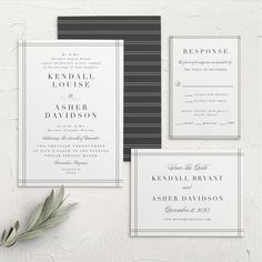 the wedding stationery is laid out on top of a white surface with black and grey stripes