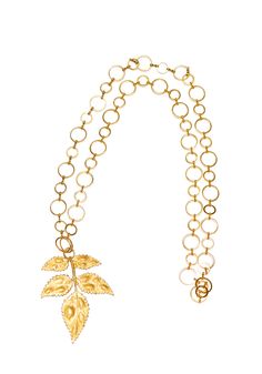 Our signature leaf design hangs on a gold chain. Size: 80cm long and 6cm wide. -- Pat’s travels to the unique markets of Asia and America are the source of inspiration for these bold, vintage designs that make up her signature ‘Essential Collection' We recommend not exposing the jewelry for one periods close to the water or high temperatures. Also spraying perfume and allowing creams to come in contact with the jewelry may affect the color of the metal, especially brass and gold plated pieces. Where possible, store each piece of jewelry in individual Pat's bags or boxes, this will stop tangling and scratching. We recommend using silver or brass cleaner cloths. Please do not use paper as this can scratch the jewelry. Brass Cleaner, Spraying Perfume, Gold Leaf Necklace, S Jewelry, Vintage Inspired Jewelry, Forever Jewelry, Gold Jewelry Necklace, Jewelry Ring Box, Leaf Necklace