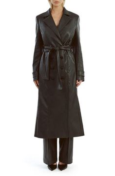 Update your outerwear portfolio with this sleek faux-leather trench coat featuring a classic notched collar and a matching tie belt. 48" length (size Small) Front button closure Notched collar Front welt pockets Removable tie belt Back vent Lined 55% polyester, 45% cotton with polyurethane coating Hand wash, line dry Imported Belted Long Leather Jacket For Business, Sleek Leather Belted Outerwear, Belted Leather Long Coat For Business, Belted Leather Long Coat Jacket For Business, Fitted Faux Leather Belted Outerwear, Sleek Belted Fall Outerwear, Sleek Belted Outerwear For Fall, Belted Long Faux Leather Coat, Belted Faux Leather Long Coat