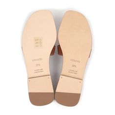 This pair of Oran Sandals are in Gold calfskin leather with contrast stitching, a natural leather insole and feature the iconic H crossover strap. Origin: ItalyCondition: New and never wornAccompanied by: Hermes box, dustbags, carebook and ribbonSize: 37.5 EU Hermes Oran Sandals, Sandals Gold, Hermes Box, Hermes Oran, Gold Box, Backpack Tote Bag, School Bags For Kids, Carry All Bag, Tote Backpack