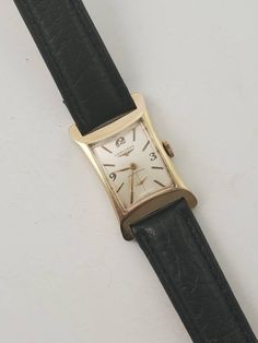 This 14K Longines manual wind watch has a beautiful dial with sub seconds above 6 o'clock. Bold lugs and the substantial case are awesome. Very nice condition solid gold Longines tank style watch. Case is 29mm x 22mm.39mm tip to tip. Classic Watches With Rectangular Dial For Collectors, Classic Collectible Watch With Rectangular Dial, Collectible Gold Watch With Rectangular Dial, Rectangular Watch, Art Deco Watch, Stud Earrings For Men, Style Watch, Watch Lover, Square Watch