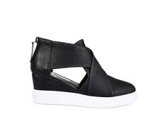 Journee Collection Seena Women's Wedge The Journee Collection Seena wedge lets you dress down in style. These faux leather wedges come with side cutouts for added flair for in jeans, athleisure trends and more. The 2 1/2" heel gives you just enough lift to elevate your sporty look. Faux leather upperBack zipperSide cutoutsCushioned footbed2 1/2" covered wedge heel Chic Wedge Sneakers For Spring, Chic Wedge Heel Sneakers For Spring, Chic Spring Wedge Sneakers With Wedge Heel, Chic Spring Wedge Sneakers, Sneaker Dress, Womens Wedge Sneakers, Black Wedge Sneakers, Athleisure Trend, Rack Room