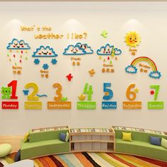 the children's room is decorated with colorful wall decals and rainbows on the walls