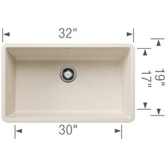 an image of a white sink with measurements