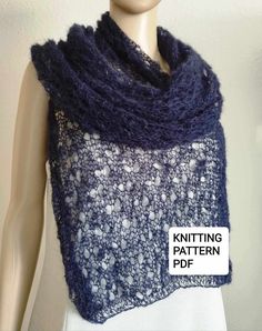 a knitted shawl on top of a mannequin headpiece with the knitting pattern