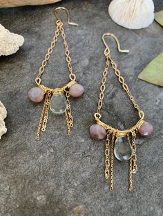 Beautiful unique gemstone dangle earrings .., crafted with hand forged gold tone accents with pretty faceted chain detail .. and hand wire wrapped Peach Moonstone and Green Amethyst gemstones . These beauties measure 4 inches in length .