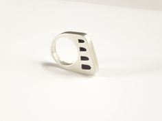 Everyone should have at least one silver statement ring in their jewelry collection. This architectural ring is hand fabricated with sterling silver and has a lovely minimalist style. Great for everyday and gift giving. Materials: sterling silver Finish: It has a satin finish Band width: approximately 3/8 inches Available sizes: US 6-14 Fabrication 1-2 weeks fabrication time Shipping: Free shipping within the US Looking for other statement rings? you can find them here https://www.etsy.com/shop/ Contemporary Silver Ring With Unique Design, Modernist Hand Cast Sterling Silver Rings, Modern Handmade Sterling Silver Signet Ring, Modern Sterling Silver Rings With Unique Design, Modern Sterling Silver Ring With Unique Design, Modern Hand Cast White Gold Ring, Contemporary Sterling Silver Rings For Gifts, Contemporary Sterling Silver Rings As Gift, Contemporary Rings With Unique Design For Gift