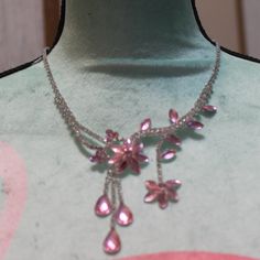 Nwt: Pink Rhinestone Flowers On This Clear Rhinestone Chain, Two Flowers On This Necklace, One Is Hanging Down On A Line Of Clear Rhinestones And The Other One Is Attached To The Necklace, 3" Hanging Down From Flower, It Has 3 Teardrops On It, 16" + 2" Silver Flower Necklace For Party, Silver Flower Necklaces For Party, Party Jewelry With Sparkling Stone Flowers, Crystal Flower Jewelry For Party, Silver Jeweled Crystal Necklace For Wedding, Elegant Pink Rhinestone Necklace With Sparkling Stones, Pink Crystal Wedding Necklaces, Pink Crystal Wedding Necklace, Wedding Crystal Necklace With Flower Design