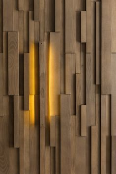 a wooden wall that has some lights on it