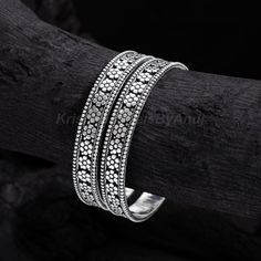 We offer only the finest silver jewelry in our collection. Material - Pure 925 Solid Sterling Silver Bangle Size - 2.5 Inches (Inside Diameter) Bangle Width - 10mm          Bangle Weight - 64 Gram Quantity - 1 Pair (2 Piece Bangle Set) Stamped 925 Free Standard Shipping Worldwide Payment Policy :- We accept payment through PayPal. All payments must be made within 7 days of purchase. If you are experiencing some difficulty in paying through PayPal and need additional time, please  contact us. Shi Luxury Silver Temple Jewelry Bangle, Silver Bangles Design Silver Bangles Design For Women, Ornate Silver Jewelry With Hand Set Details, Ornate Hand Set Silver Jewelry, Fusion Style Silver Bracelets With Oxidized Finish, Antique Silver Elegant Bangle, Silver Fusion Bracelets With Oxidized Finish, Silver Oxidized Finish Fusion Bracelets, Silver Metal Fusion Bracelets