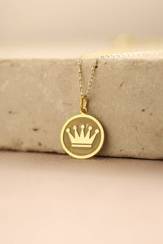 Gold Crown Pendant - Crown Gold Necklace ● Material of pendant: Solid Gold 14k ( REAL GOLD ) ● Metal Stamp: 14k ( REAL GOLD ) ● The pendant is available in 5 sizes: - 12,7 mm / 0.5 inches (Diameter) - 14,0 mm / 0,55 inches ( Diameter ) In the photos - 15,3 mm / 0.6 inches ( Diameter ) - 16,5 mm / 0,65 inches ( Diameter ) - 19,1 mm / 0,75 inches ( Diameter ) ( In the photos the size is 14mm / 0.55 inches Diameter ) ( Jump Ring inner diameter: 4 mm ) ● Material of chain: Solid gold 14k ( REAL GOLD Custom 14k White Gold Round Pendant Necklace, Gold Sterling Silver Custom Necklace With Charms, 14k Gold Necklaces With Round Pendant Charms, 14k Gold Necklace With Charms And Round Pendant, 14k Gold Medallion Necklace With Charms, 14k Gold Tarnish Resistant Custom Necklace, Symbolic Yellow Gold Necklaces For Formal Occasions, 14k Gold Round Pendant Charm Necklace For Wedding, Gold Custom Round Necklace For Formal Occasions