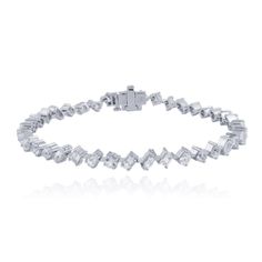 This stunning 14K Solid Gold Multi Shape White Topaz Tennis Bracelet, is crafted to perfection with a sophisticated mix of multi-shaped white Topaz gemstones. This luxury tennis bracelet exudes glamour and style, making it the perfect accessory to elevate any outfit, whether attending a special event or adding a touch of sparkle to your everyday look.Each white topaz gemstone is carefully set in a sleek 14K solid gold framework, creating a seamless flow of brilliance. The unique combination of r Modern White Diamond Bracelet For Formal Occasions, Modern White Bracelets With Diamond Accents, Modern White Tennis Bracelet For Formal Occasions, Modern White Diamond Cut Bracelet, White Cubic Zirconia Fine Jewelry Bracelet, White Cubic Zirconia Bracelets Fine Jewelry, Modern White Diamond Bracelets, Modern White Tennis Bracelet For Wedding, White Diamond Gemstone Bracelet For Anniversary