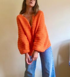 Orange solid cardigan for women. This orange sweater, has a gorgeous open front and is 100% handmade.This crochet cardigan is made with hight quality yarn, anti allergic and super super soft. This amazing oversize fall cardigan is the garment that you would want wear it forever! Perfect to wear it with dresses or with a jean! Super comfortable, stylish and versatile! WHICH IS MY SIZE? In order to know which is the perfect size for you, you just have to measure your chest. Below, you can find the measurements referred to every size: Measurements referring to the chest contour:  Size: waist: 104 cm/ 41 in. Length: 53 cm/ 20.5 in. If you can't find your size or you are not sure about the size, contact me and I will make the one that fits your measurements. HOW TO KEEP YOUR CARDIGAN PERFECT: I Orange Crochet Cardigan, Oversized Orange Cardigan For Winter, Oversized Orange Winter Cardigan, Casual Orange Hand Knitted Sweater, Orange Hand Knitted Sweater For Fall, Hand Knitted Orange Sweater For Fall, Fall Crochet V-neck Cardigan, Fitted Cardigan Outfit, Orange Cardigan Outfit