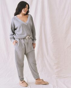 The V-Neck Sweatshirt. -- Varsity Grey – The Great. Emily And Meritt, College Sweatshirt, Leg Cuffs, Product Label, Deep V Neck, Raglan Sleeve, Two Pieces, Style Guides, Military Jacket