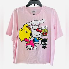 Sanrio X Bioworld Hello Kitty & Friends Graphic Character T-Shirt (Pink) Condition: Brand New Without Tags Note: Please View Photos Carefully For Item Description. Thank You. Cute Pink T-shirt With Graphic Print, Casual Pink Hello Kitty T-shirt, Spring Pink T-shirt With Hello Kitty Print, Trendy Pink T-shirt With Character Print, Playful Pink Short Sleeve T-shirt, Kawaii Hello Kitty T-shirt For Spring, Hello Kitty Fun Crew Neck Top, Hello Kitty Crew Neck Fun Tops, Pink Hello Kitty Print T-shirt For Spring