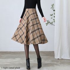 "★★ FEATURES * Wool skirt * Polyester lining * Two side seam pockets * Right zipper closure * back little elastic band * Plus size full skirt * A Line Skirt * Perfect for Winter, autumn * Dry clean ★★ The model is 170 cm (5′ 7″) tall with a 80 cm (31.5\") bust, 66 cm (26\") waist. She is wearing the plaid wool skirt in size XS. ★★ Bespoke Order Service If you Request other color Request the length Your height is not between 155 cm- 172 cm Your weight is over 75 kg I can do it for you, It will ne Knee Length Plaid Skirt Outfit, Beige Flared Skirt For Winter, Winter Beige Flared Skirt, Beige Winter Midi Skirt, Winter Beige Lined Skirt, Plaid Lined Skirt For Winter, Winter Wool A-line Skirt, Casual A-line Winter Skirt, Beige Long Skirt For Winter