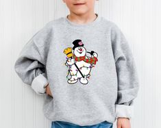 Frosty the Snowman Christmas Shirt, Snowman Shirt, Frosty Christmas Shirt, Frosty Sweatshirt, Snowman Lover Outfit, Merry Christmas 2024 - Etsy Lover Outfit, Snowman Shirt, Frosty The Snowman, The Snowman, Snowman Christmas, Christmas 2024, Christmas Snowman, Christmas Shirt