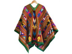 "Unique Peruvian Poncho forms intricate geometric patterns in natural colors. This traditional-style unisex poncho from Peru. It features stunning, intricately woven designs that date back to before the Inca empire, showcasing the skill of the weaver, which is passed down from generation to generation. Poncho unique, there is no other like it. Handmade on a loom. Traditional poncho from Ayacucho, Peru. Size: 65\" L x 58\" W - (165 x 145 cm)" Lipan Apache, Peruvian Poncho, Embroidered Cape, Inca Empire, Oc Inspo, The Weaver, Wool Poncho, Poncho Cape, Natural Colors