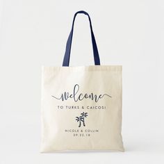 a tote bag with the words welcome and palm trees in black ink on it